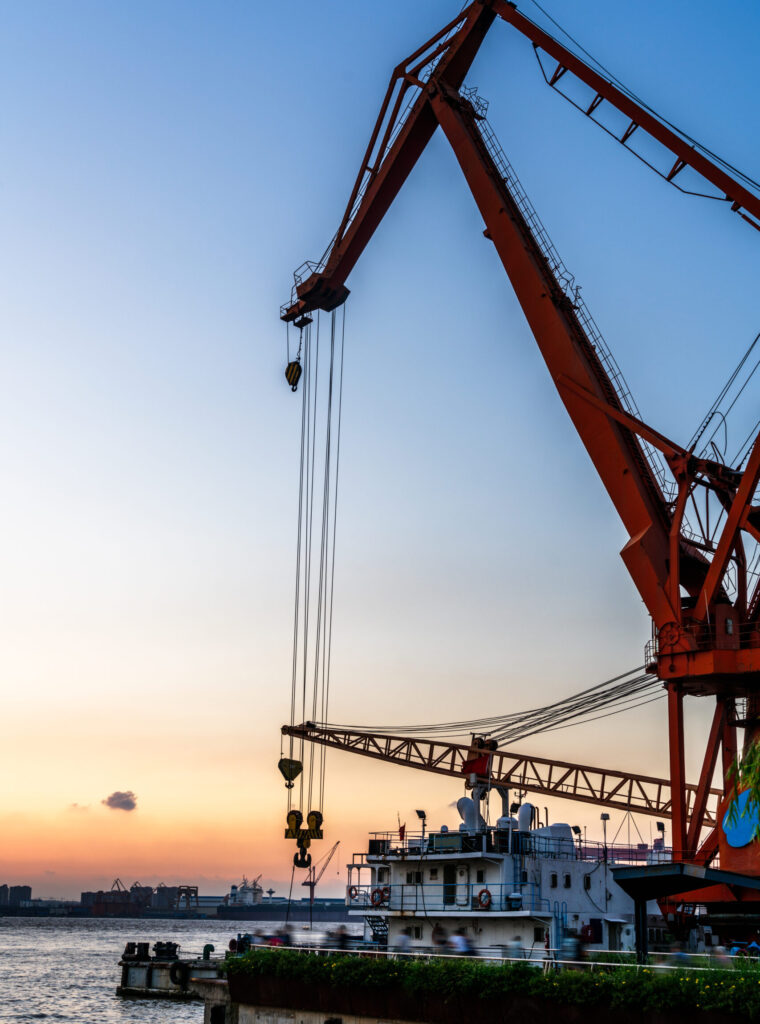 Cargo container ship at harbor in city of China.